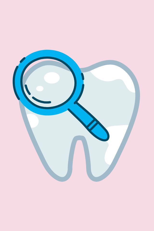 Ząb z białymi plamami pod lupą